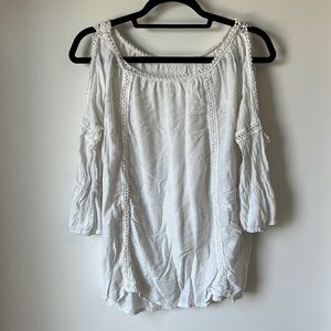 white blouse with shoulder cut outs